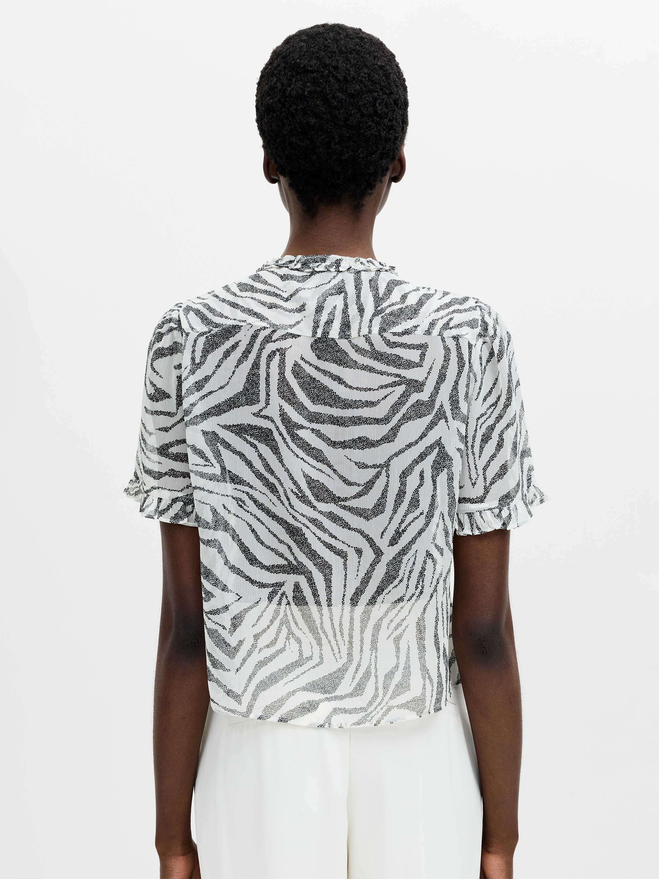 Josie Short Sleeve Zebra Print Ruffle Top